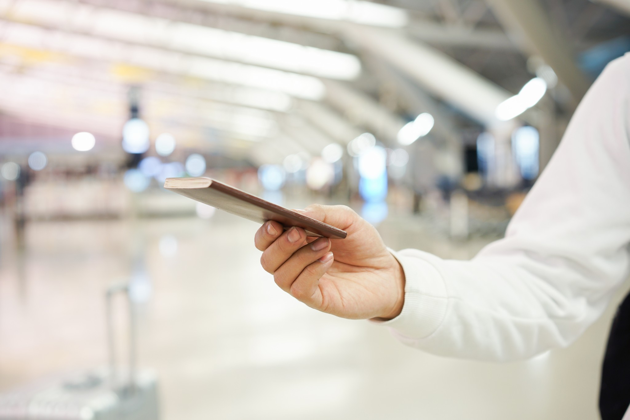 Close Up Traveller Man Hand Holding Passport And S Bbspsp7