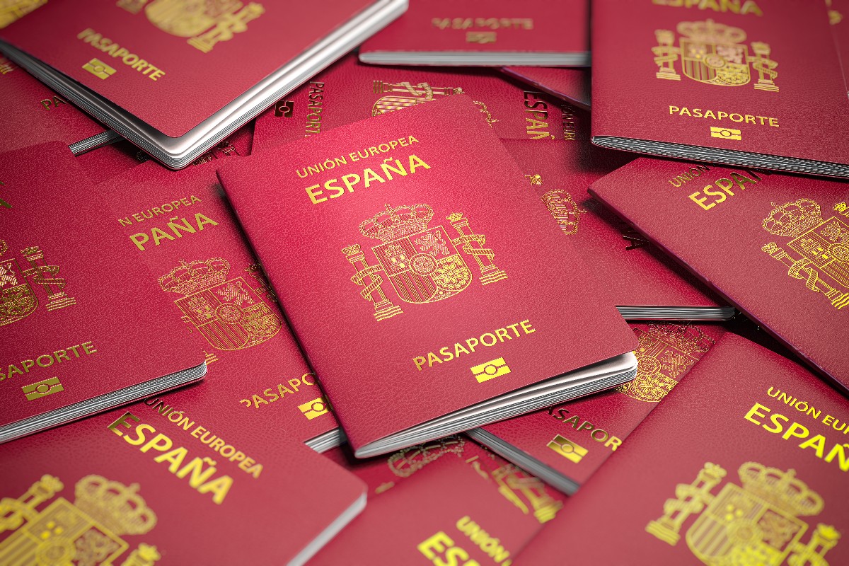 Heap Of Spain Passports. Immigration, Citizenship, Travel And To